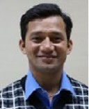 Dr. Mahesh Singh Dhapola